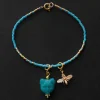 Beaded Bracelet - Turquoise Glass Cat, Gold Bee