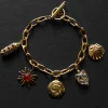Chunky Gold Talisman Bracelet - Eye of Horus Charm