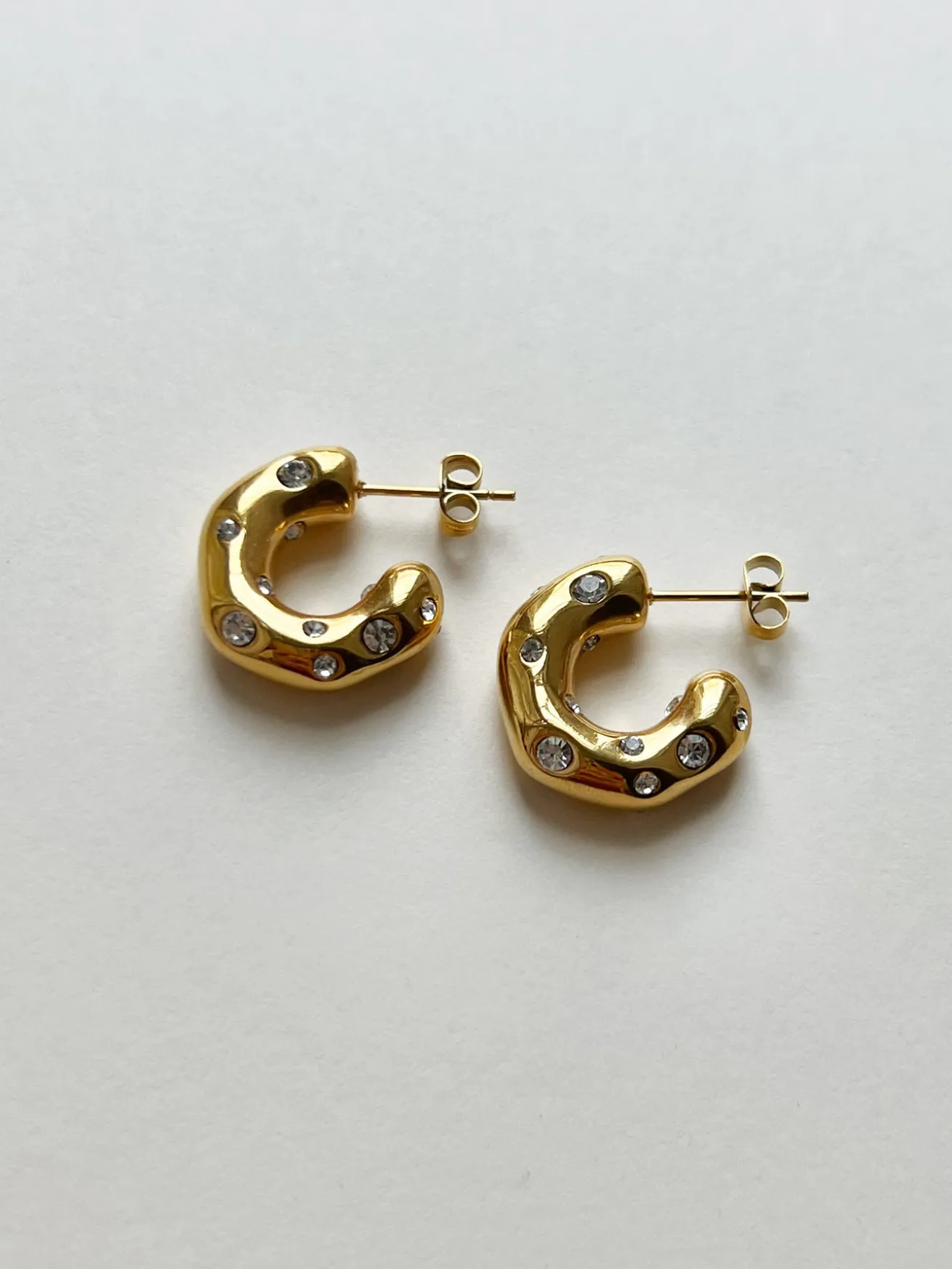 Gemstone-encrusted hoops