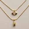 Layered Necklace With Symbolic Pendants - Eye/Teardrop
