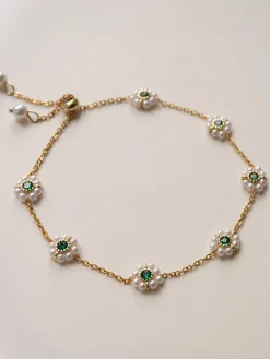 Petite Pearl Flower Bracelet With Emerald Gemstones