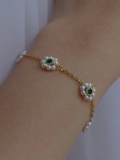 Petite Pearl Flower Bracelet With Emerald Gemstones